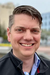 Headshot of Nick Begich